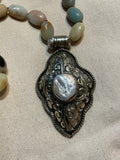 Ancient City - Knotted Amazonite Ovals with Tibetan Silver Pendant Ancient City - Knotted Amazonite Ovals with Tibetan Silver Pendant