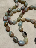 Ancient City - Knotted Amazonite Ovals with Tibetan Silver Pendant Ancient City - Knotted Amazonite Ovals with Tibetan Silver Pendant