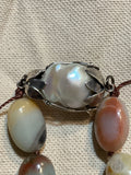 Ancient City - Knotted Amazonite Ovals with Tibetan Silver Pendant Ancient City - Knotted Amazonite Ovals with Tibetan Silver Pendant